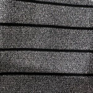 Black and silver lurex skirt knee length , knitted style very fitted .